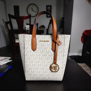 Michael Kors is a small clutch